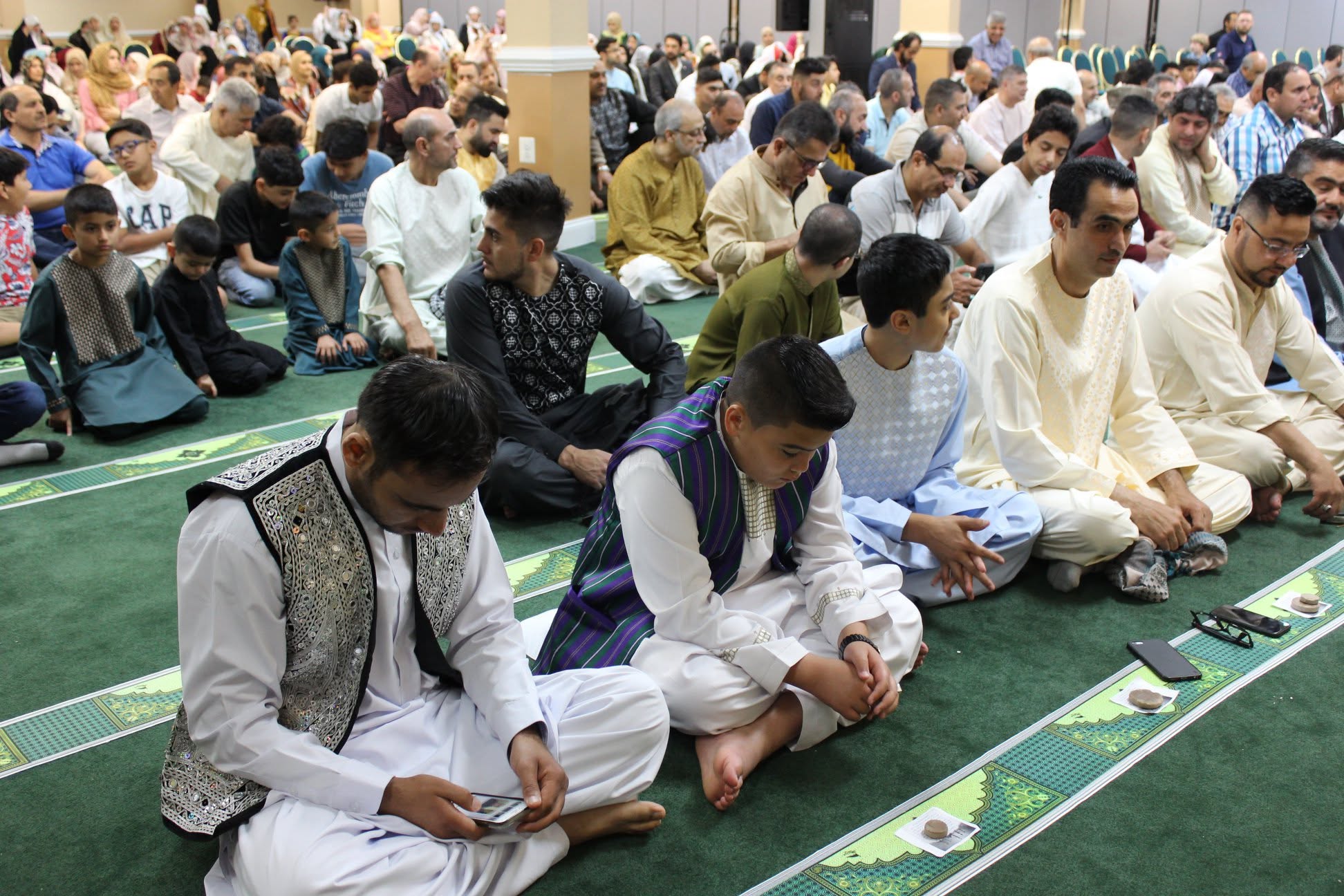 The community preparing for Eid prayer at IAC