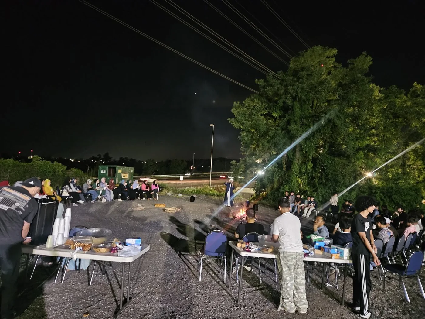 The IAC community gathered outdoors for an evening program