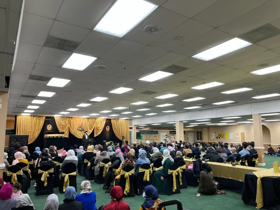 Community members celebrating the birth anniversaries of Imam Ali and Imam Jawad