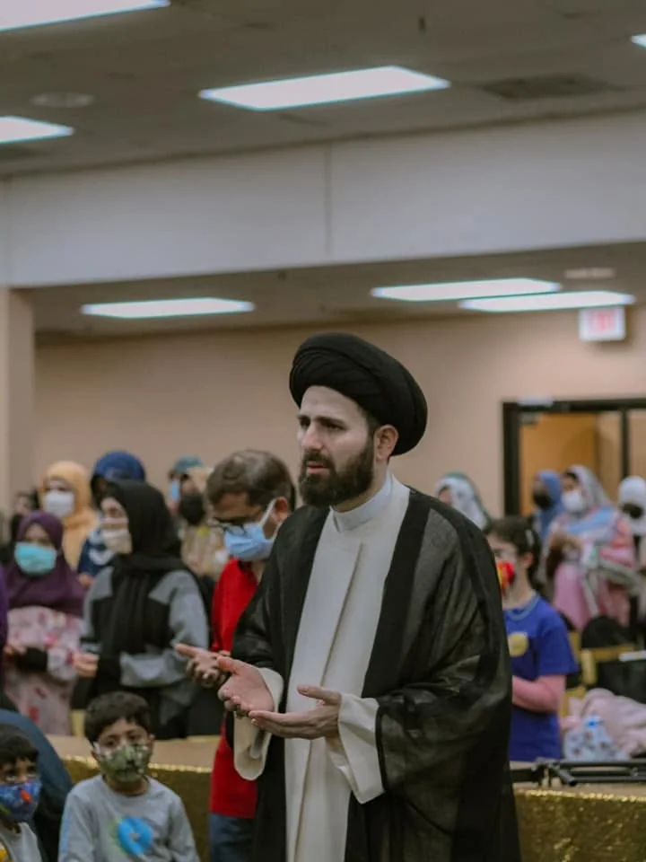 Community members celebrating the birth anniversaries of Imam Ali and Imam Jawad